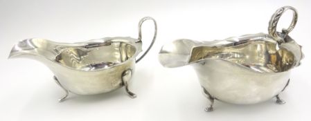 Silver sauce boat by Viners Sheffield 1931 and a similar boat approx 4.