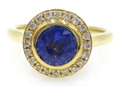 18ct gold sapphire and diamond cluster ring , rub-over setting hallmarked sapphire approx 1.