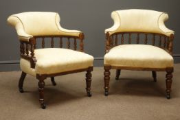 Pair Edwardian walnut tub shaped armchairs, turned gallery back upholstered in damask fabric,