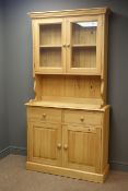 Solid pine dresser, projecting cornice, two glazed cupboards doors enclosing two shelf,