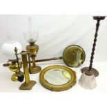 Two brass table oil lamps with glass shades and chimneys, smokers oak barley twist stand,