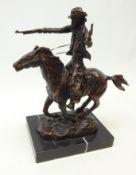 Patinated bronze study of a Cowboy with a pistol & shotgun on a galloping horse after Karl Kauba,