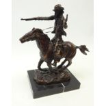 Patinated bronze study of a Cowboy with a pistol & shotgun on a galloping horse after Karl Kauba,