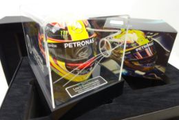 Lewis Hamilton signed 1:2 scale 2017 helmet, on LED light up display stand with clear cover,
