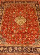 Persian Mahal red ground carpet, floral design, repeating blue ground border,