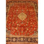 Persian Mahal red ground carpet, floral design, repeating blue ground border,