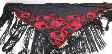 Art Deco style black satin shawl with red bead work decoration and long tasseled fringe