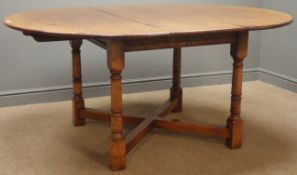 Reproduction oak extending dining table, with additional leaf,