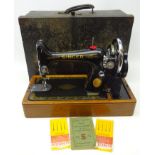 Early 20th century Singer sewing machine with original instructions and case Condition