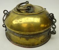 Eastern brass food warmer, possibly Tibetan, of circular form with domed lid and chain hinges,