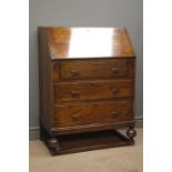 Early 20th century oak bureau, fall front enclosing fitted interior with leather inset,