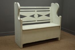 Pine hall bench, pierced back, with hinged seat encolising storage space, solid end supports,