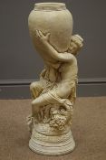 Classical composite stone figure of a woman holding a vase,