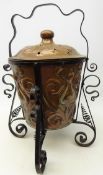 Art Nouveau embossed copper coal bin decorated with stylized flowers,