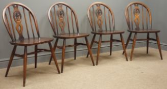 Set four Ercol 'Fleur-de-Lis' elm and beech dining chairs Condition Report <a