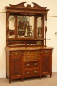 Edwardian walnut sideboard, shaped and carved pediment, two turned and fluted columns,