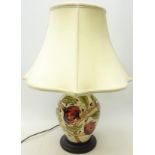 Moorcroft 'Pirouette Breeze' table lamp of baluster form on plinth with shade,