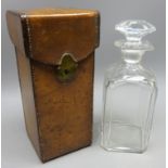 19th century leather travelling case with brass fittings and matched cut glass decanter,