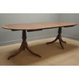 Early to mid 20th century Regency style mahogany and mahogany banded twin pedestal dining table,