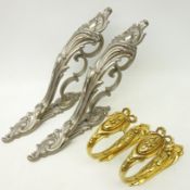 Two pairs of cast metal wall brackets,