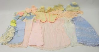 1950's children's clothing including knitted cardigans, bonnets, shoes, embroidered cotton dresses,