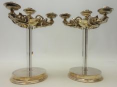 Pair silver-plated cast metal four branch candelabra, cast with three scrolled sconces,