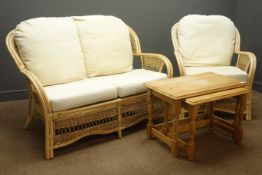 Cane conservatory two seat settee and matching armchair with upholstered back and seat cushions and