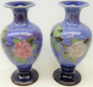 Pair early 20th century Royal Doulton stoneware baluster vases decorated with tube-lined roses,