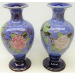 Pair early 20th century Royal Doulton stoneware baluster vases decorated with tube-lined roses,