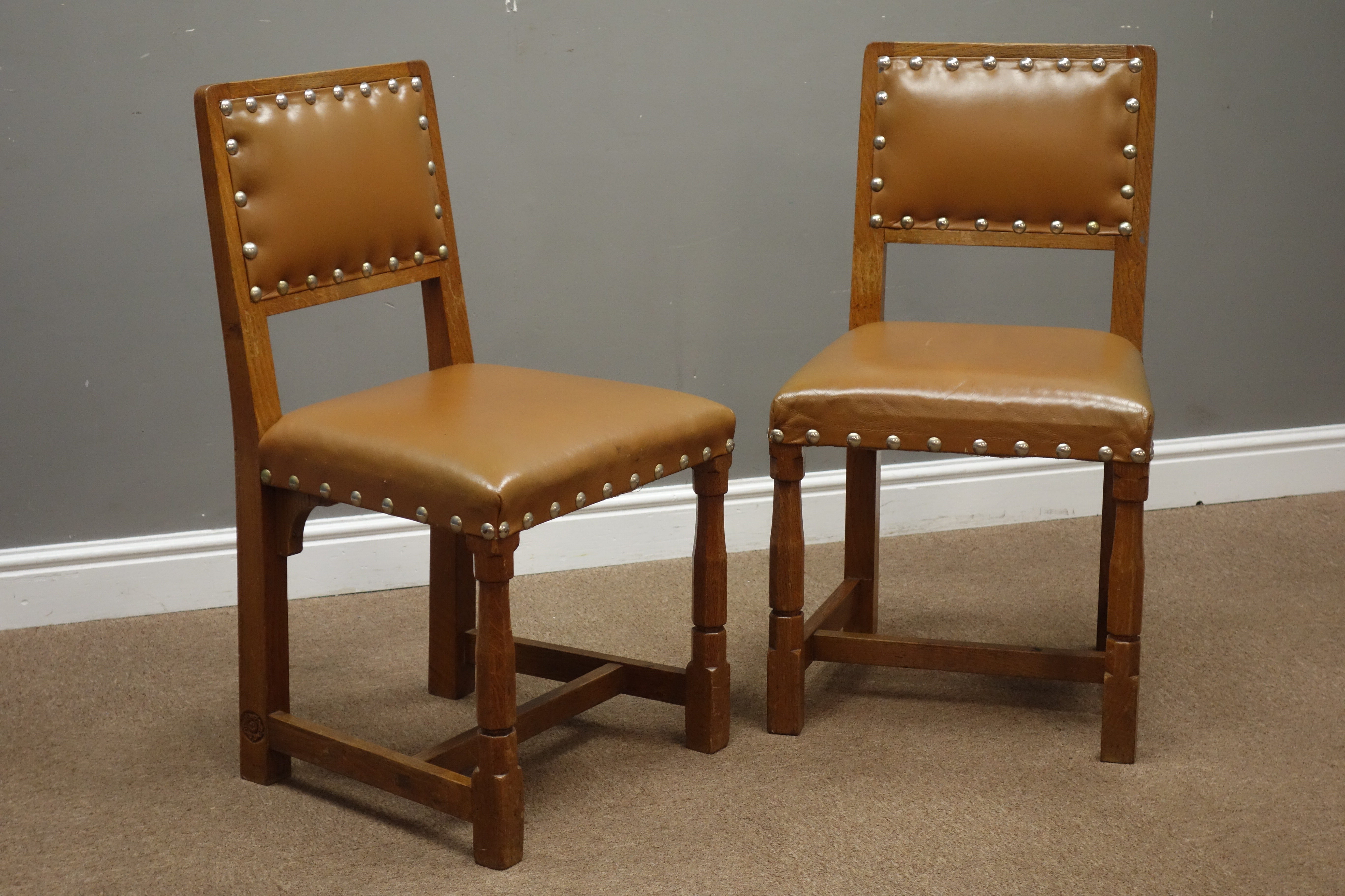 Pair Yorkshire oak dining chairs carved with Yorkshire Rose motif,