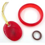 Red jade pendant, jade ring and red jade bangle Condition Report <a href='//www.