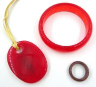 Red jade pendant, jade ring and red jade bangle Condition Report <a href='//www.