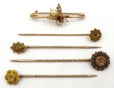 Gold pearl and stone set insect brooch (tested 9ct) and four gold stick pins stamped 15ct