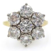 18ct gold seven stone diamond ring in flower setting, approx 2.