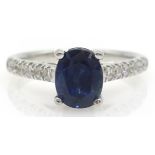 18ct white gold oval sapphire and diamond shoulder ring hallmarked Condition Report
