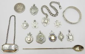 Dutch silver mote spoon, claret label, hallmarked silver medals, watch chain,