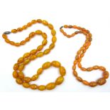 Two early 20th century amber type bead necklaces Condition Report <a