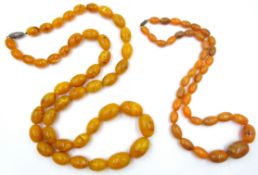 Two early 20th century amber type bead necklaces Condition Report <a