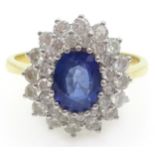 18ct white gold oval sapphire and diamond double cluster ring hallmarked Condition Report