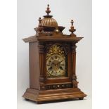 Early 20th century walnut mantel clock, architectural case, gadroon dome top with turned finials,