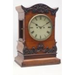 Large Victorian mantle clock, serpentine pediment with floral carved mounts,