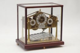 Devon Clocks - Congreve type brass 'Rolling Ball' clock, with Arabic hour, minute and second dials,