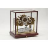 Devon Clocks - Congreve type brass 'Rolling Ball' clock, with Arabic hour, minute and second dials,