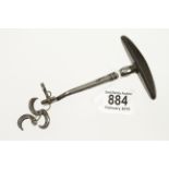 A 19c French dental key with decoratively turned and knurled shaft and horn handle,