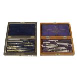 Two sets of drawing instruments in orig fitted boxes G