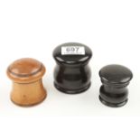 Three screwtop boxes in ebony and boxwood 2" to 2 1/2" G+