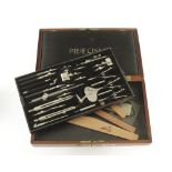 A fine mahogany lockable cased drawing set by PRAECISUS as illustrated with minor items in lid and