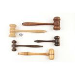 A collection of five gavels in assorted timbers G++