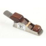 A steel thumb plane 5" x 1/2" with mahogany wedge G