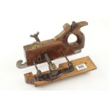 A rare handled KIMBERLEY plough plane with skate front and boxwood fence,